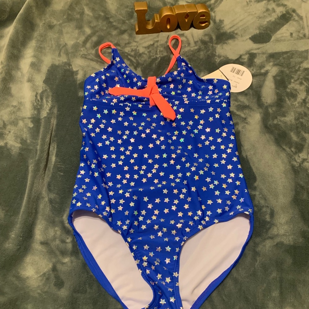 Blue with a iridescent star print bathing suit.